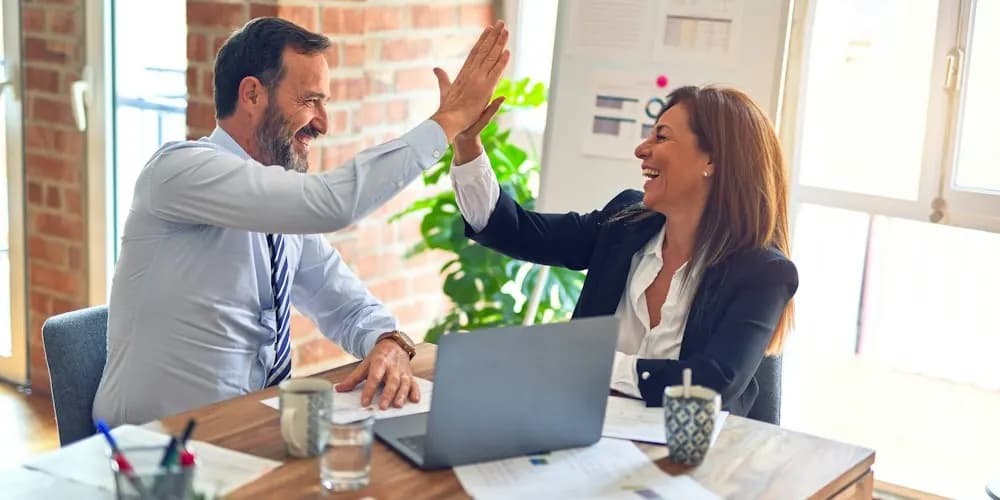 Team working together in a bright office